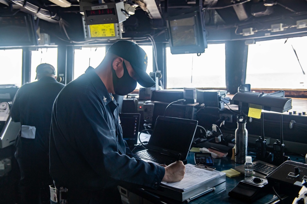 Quartermaster Logs Ship's Position Aboard USS Michael Murphy (DDG 112)