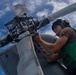 Sailor Conduct Maintenance on an MH-60R Seahawk Aboard USS Michael Murphy (DDG 112)