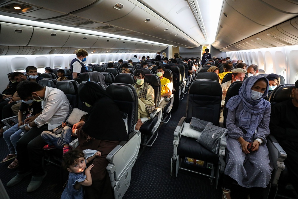 Evacuees from Afghanistan depart NAS Sigonella on a full flight