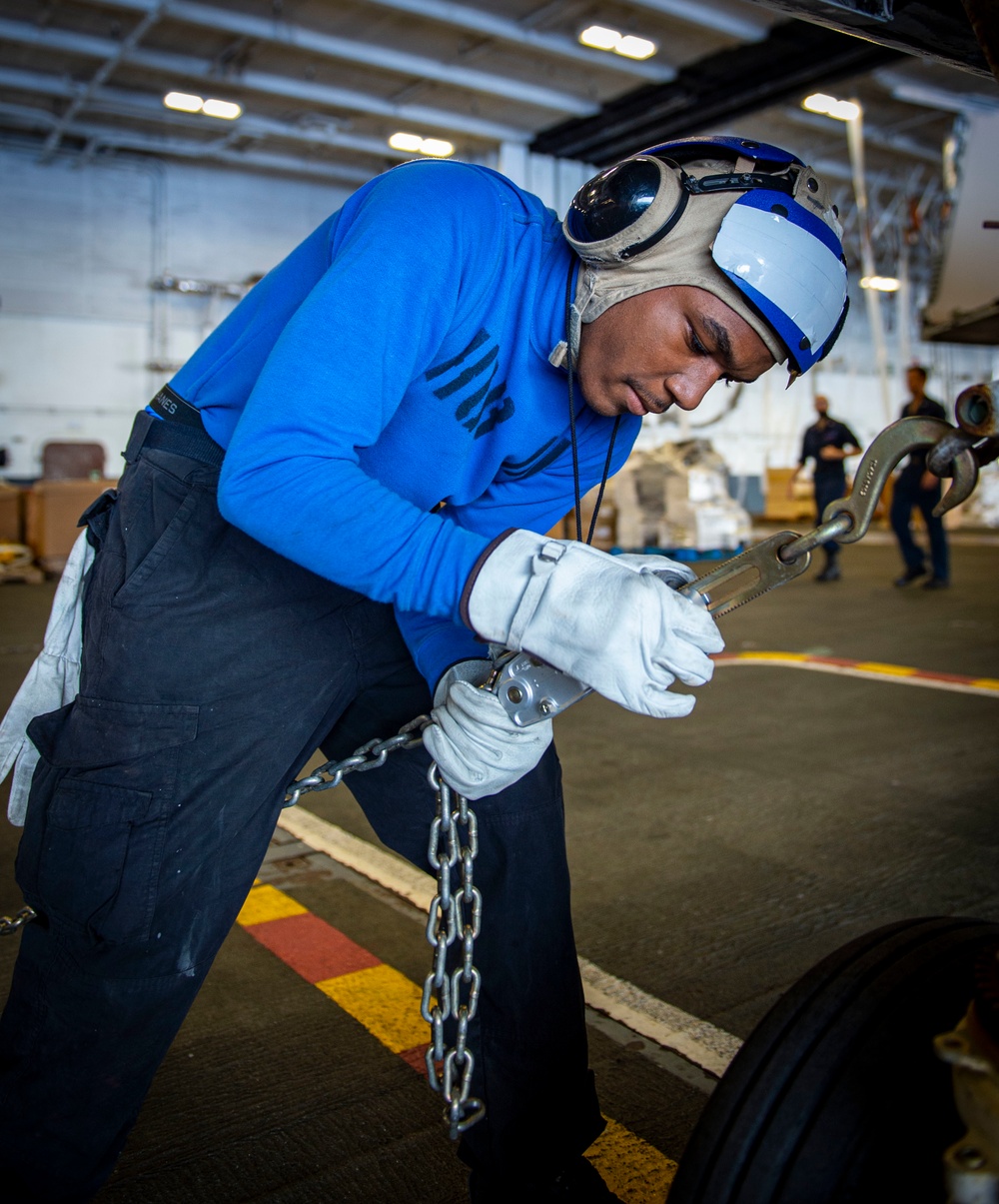 GHWB Sailor Secures Training Aircraft