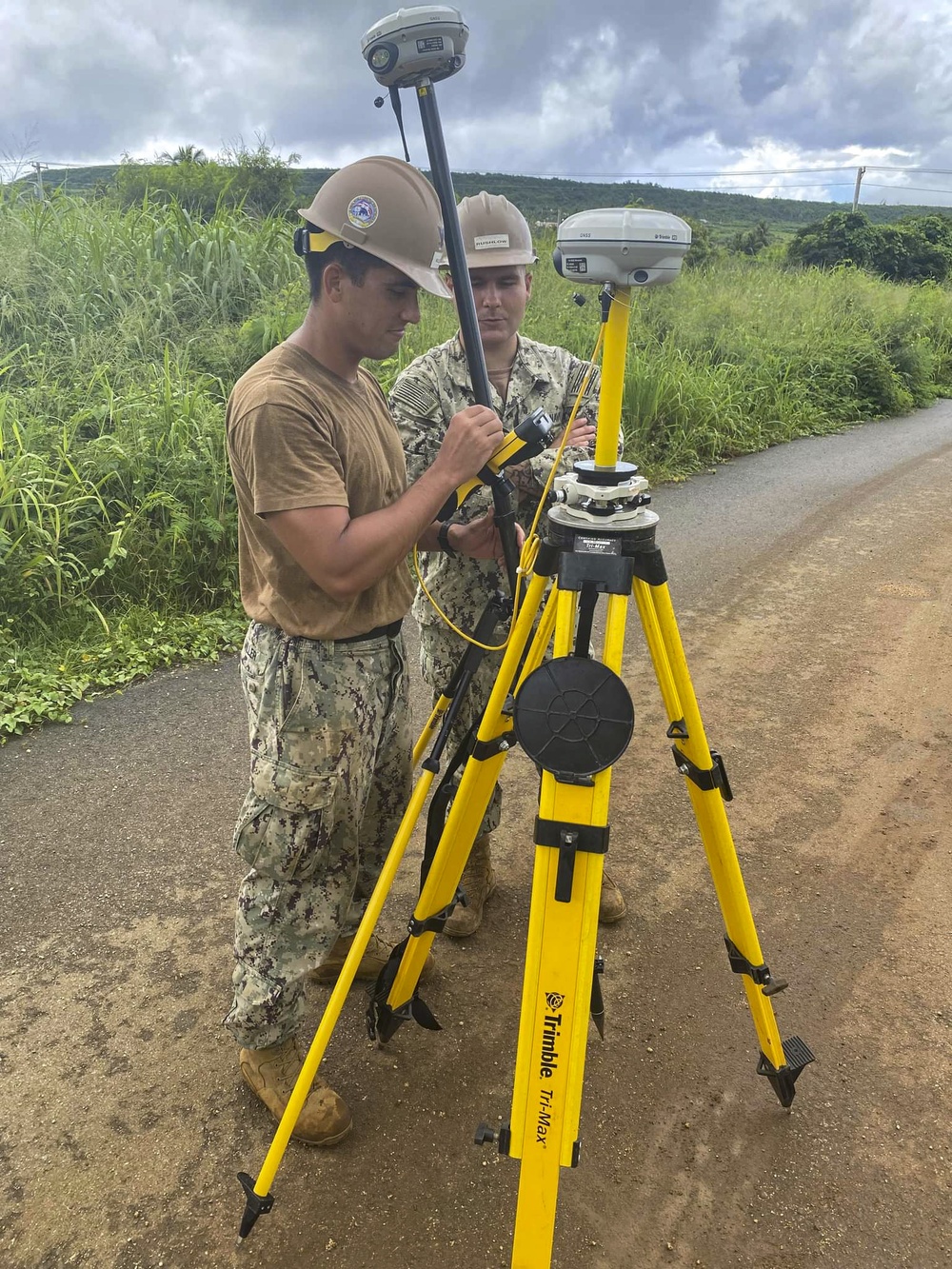 US Navy Seabees assigned to NMCB-5 pave and repair roadways in Tinian, Northern Mariana Islands