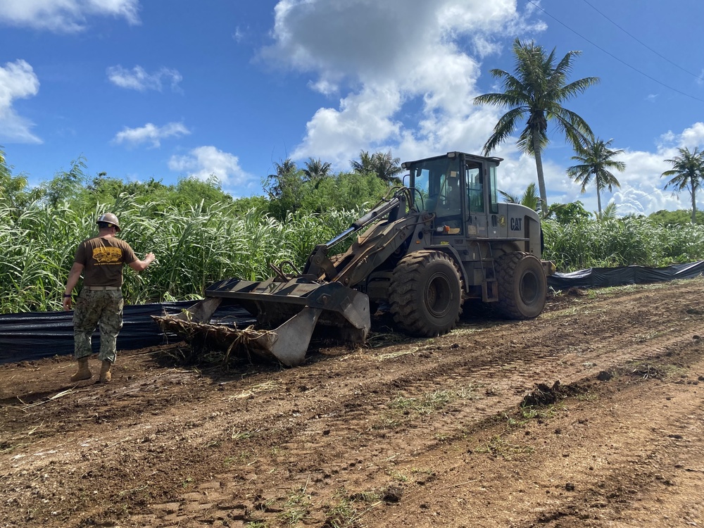 US Navy Seabees assigned to NMCB-5 pave and repair roadways in Tinian, Northern Mariana Islands