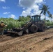 US Navy Seabees assigned to NMCB-5 pave and repair roadways in Tinian, Northern Mariana Islands