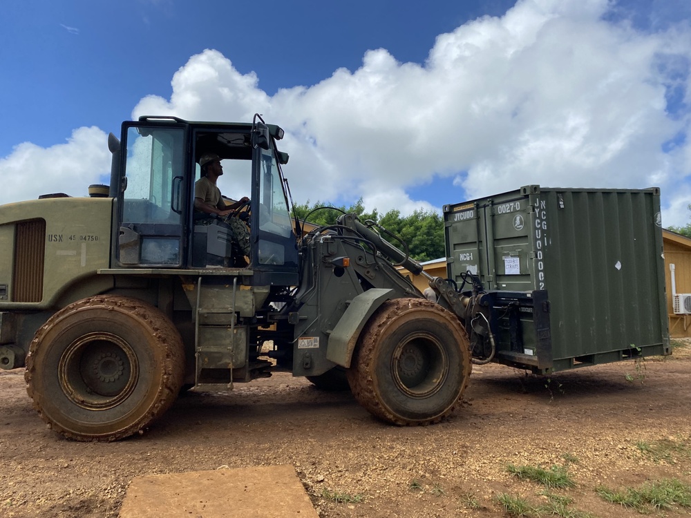 US Navy Seabees assigned to NMCB-5 pave and repair roadways in Tinian, Northern Mariana Islands