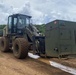 U.S. Navy Seabees assigned to NMCB-5 pave and repair roadways in Tinian, Northern Mariana Islands