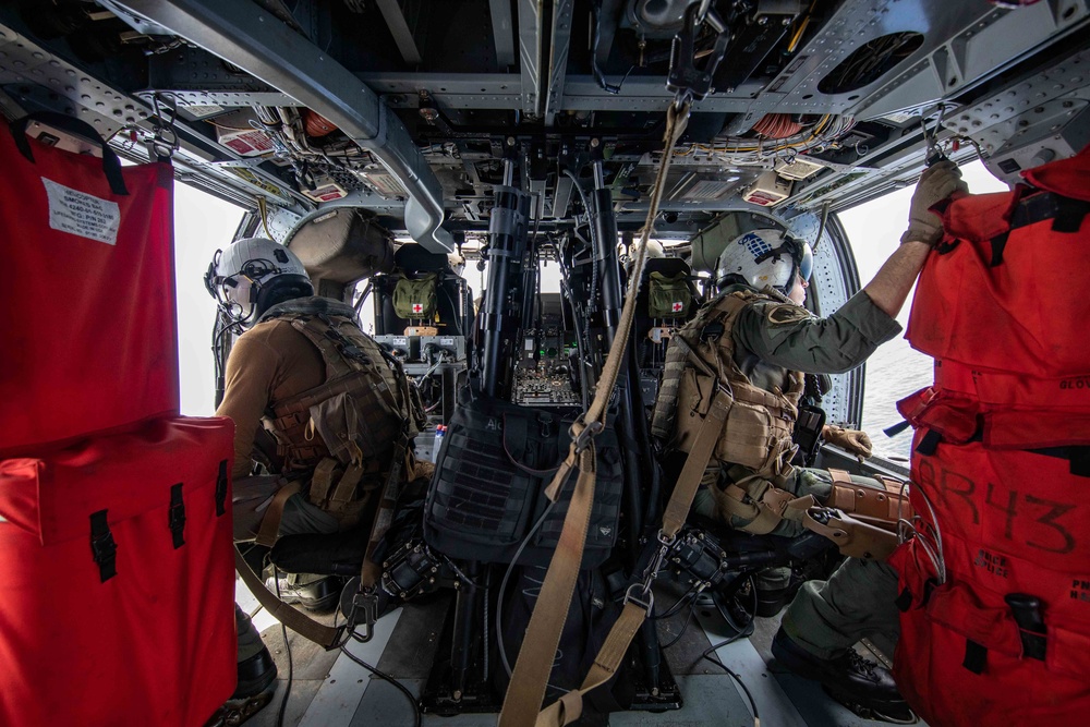 HSC-28 Helicopter Flies Into Haiti To Support The Humanitarian Aid Mission