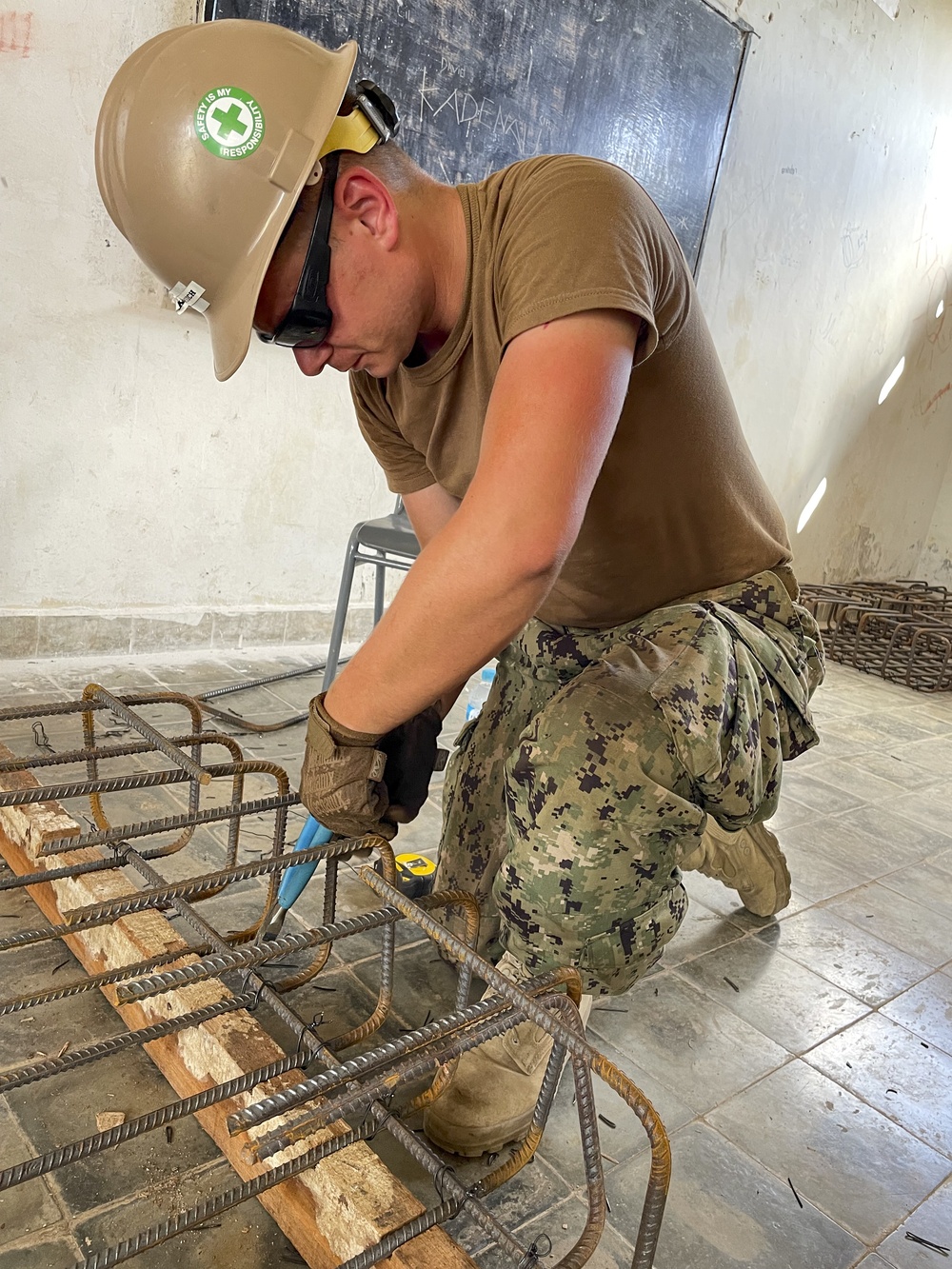 US Navy Seabees with NMCB-5 build a schoolhouse in Timor-Leste to support the local Ministry of Education