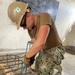 US Navy Seabees with NMCB-5 build a schoolhouse in Timor-Leste to support the local Ministry of Education