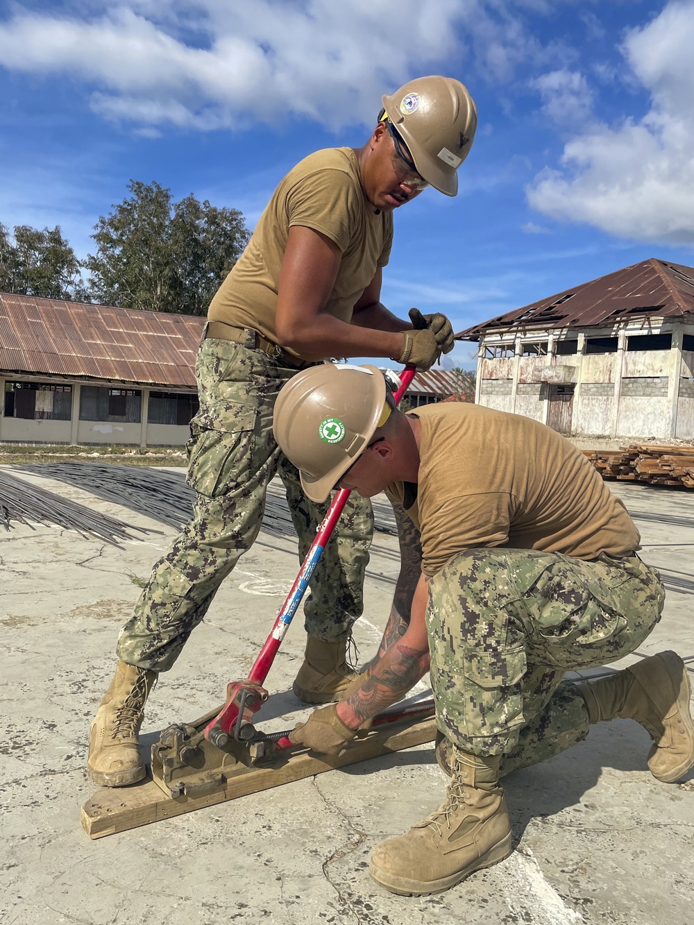 US Navy Seabees with NMCB-5 build a schoolhouse in Timor-Leste to support the local Ministry of Education