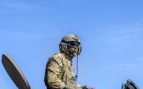 Marines and Australian conduct a mechanized infantry assault for Exercise Koolendong