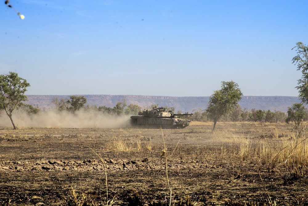 Marines and Australian conduct a mechanized infantry assault for Exercise Koolendong