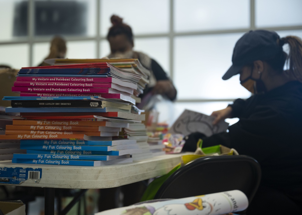 U.S. Airmen, civilians and military spouses from Team Mildenhall and Liberty Wing volunteer in support of Operation Allies Refuge at Royal Air Force Mildenhall