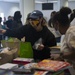 Volunteers packed and organized children’s supplies to aid during OAW