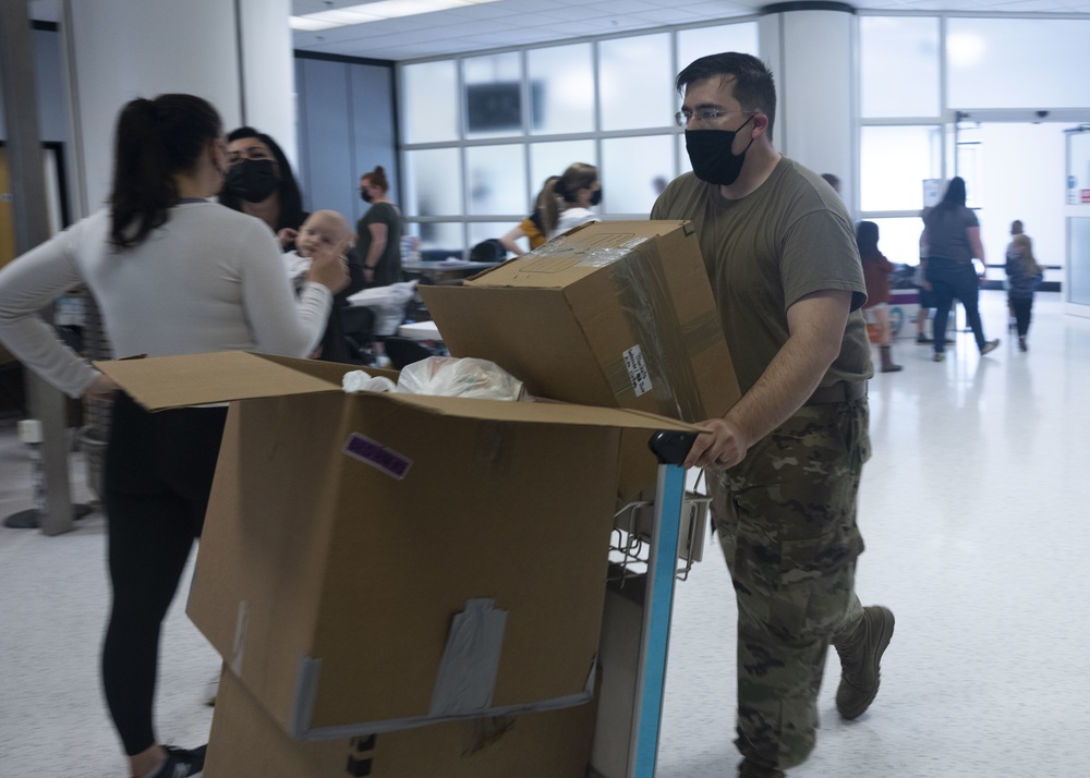 U.S. Airmen, civilians and military spouses from Team Mildenhall and Liberty Wing volunteer in support of Operation Allies Refuge at Royal Air Force Mildenhall