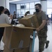 U.S. Airmen, civilians and military spouses from Team Mildenhall and Liberty Wing volunteer in support of Operation Allies Refuge at Royal Air Force Mildenhall