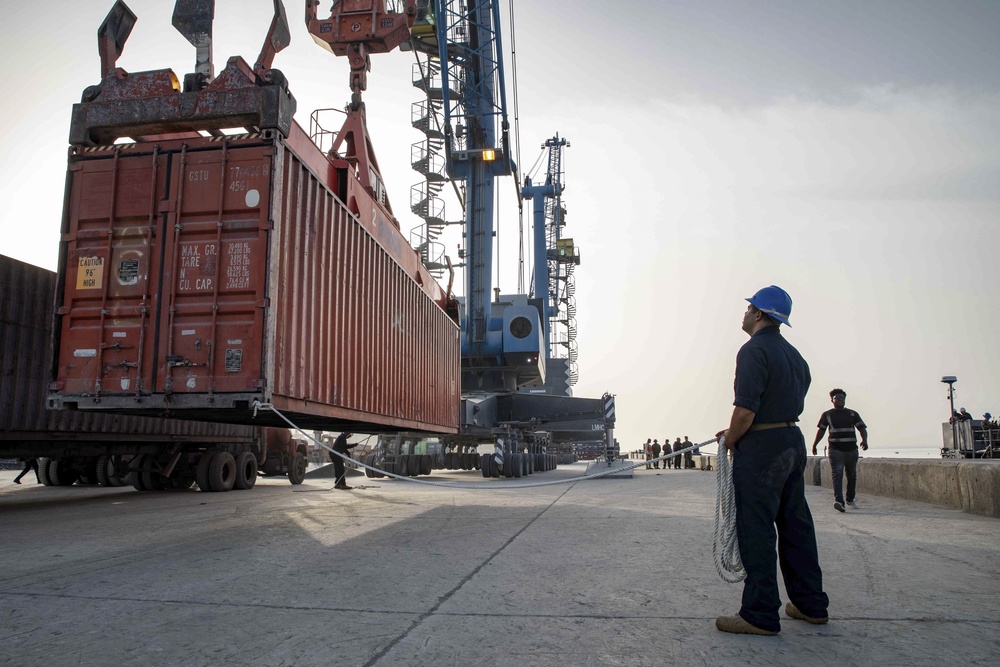 Sailor Tends A Safety Line