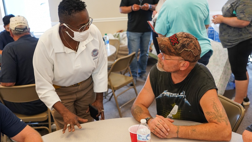 FEMA Federal Coordinating Officer Shird Speaks to Survivor