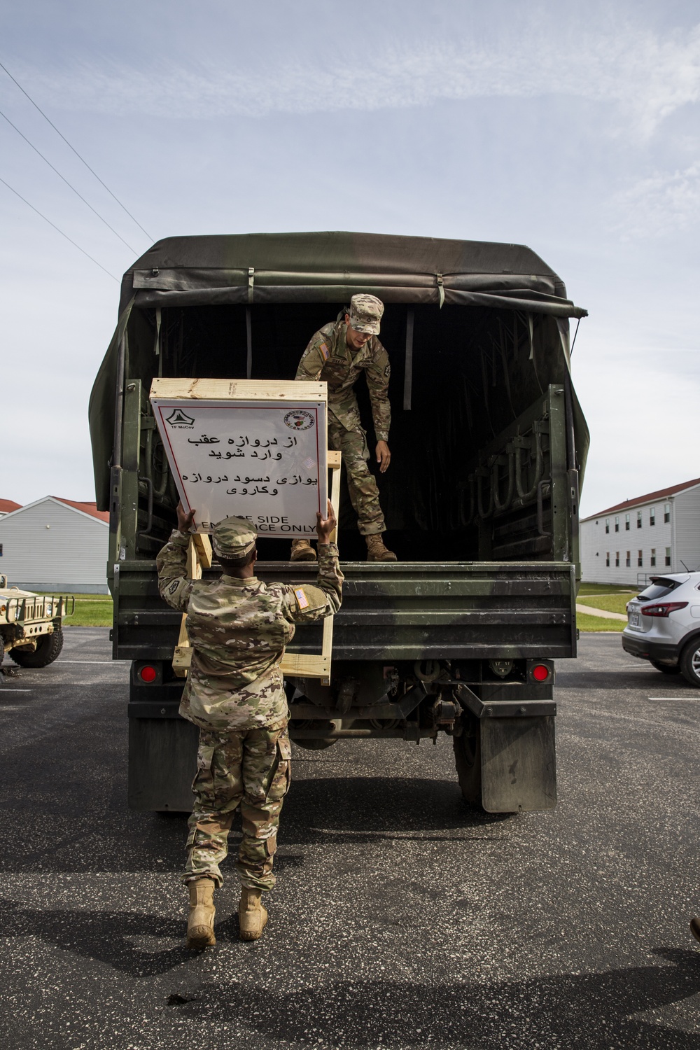 610th Engineer Company Soldiers Unload Signs at Fort McCoy