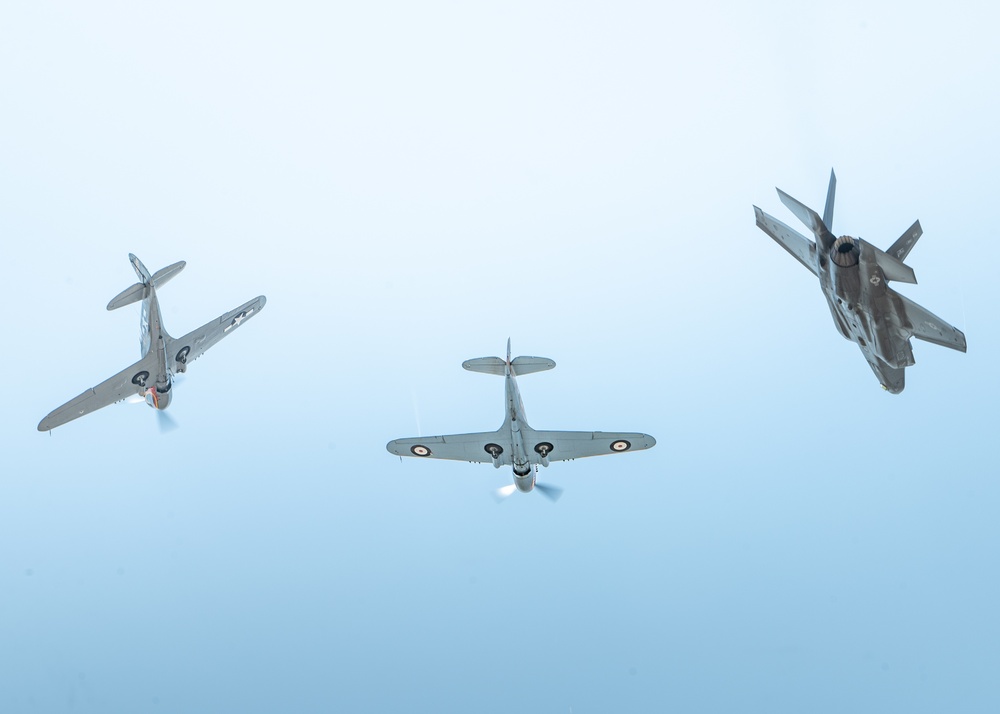 The F-35A Demonstration Team performs heritage flight with two P-40 Warhawks