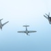 The F-35A Demonstration Team performs heritage flight with two P-40 Warhawks