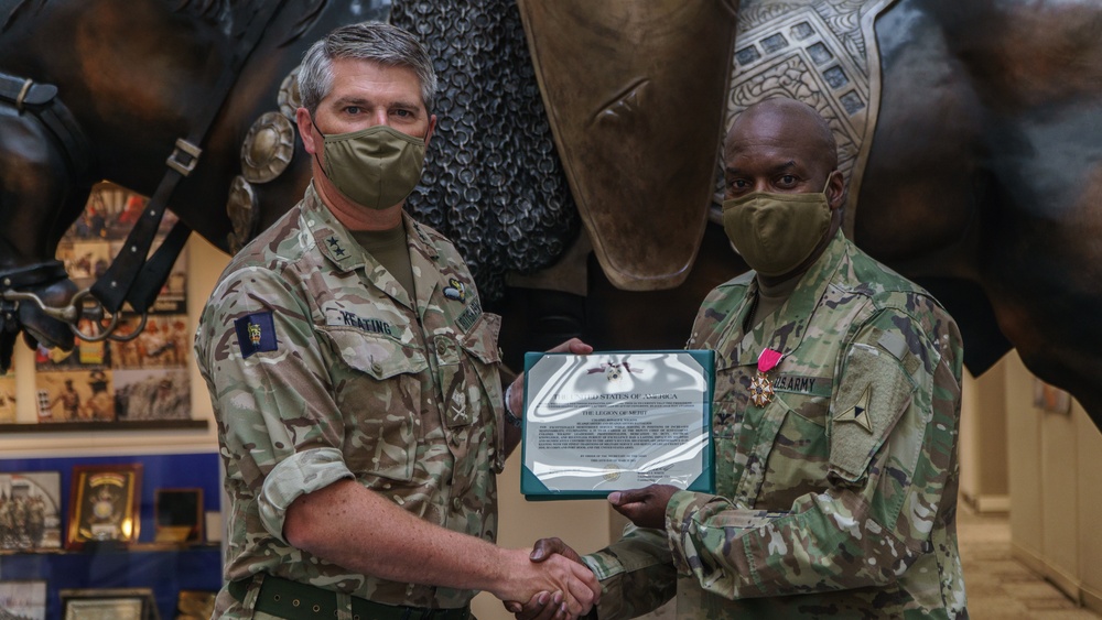 III Corps presents LOM to Col. Ronald Wilkins