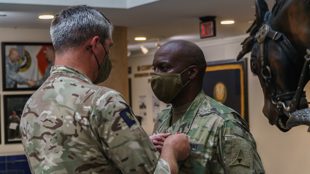 III Corps presents LOM to Col. Ronald Wilkins