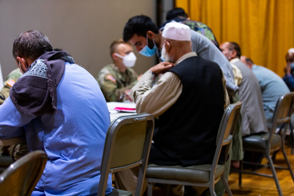 Afghan Evacuees Begin their In-Processing During Operations Allies Welcome at Fort Fort Pickett, Virginia.