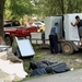 Survivors of Flooding Removing Damaged White Goods