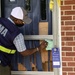 FEMA in the Neighborhood Leaving Information at the Door