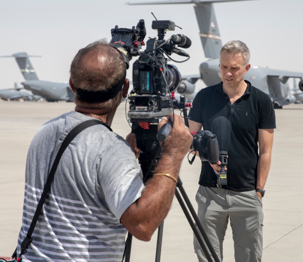 Media news outlets tours facilities supporting Afghanistan Evacuation