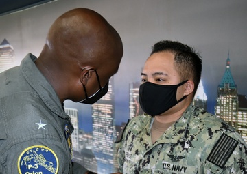 Rear Adm. Stephen Barnett frocks Sailor
