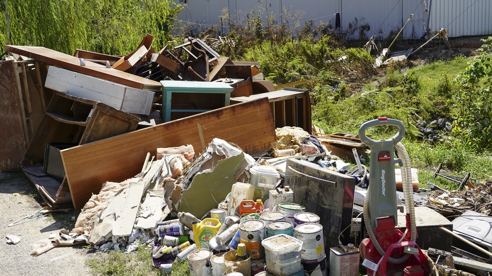 Debris Separated by Type on the Side of the Road