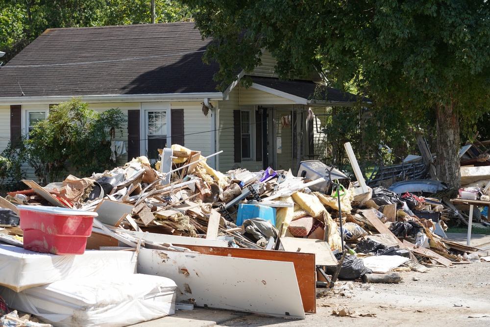 Damaged Personal Property Moved to the Street for Collection