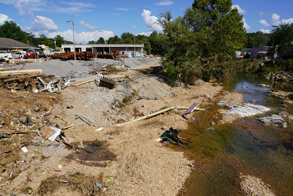 The Creek That Was Blocked With Debris Causing the Flooding