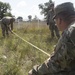 McCoy builds clotheslines for Afghans to use