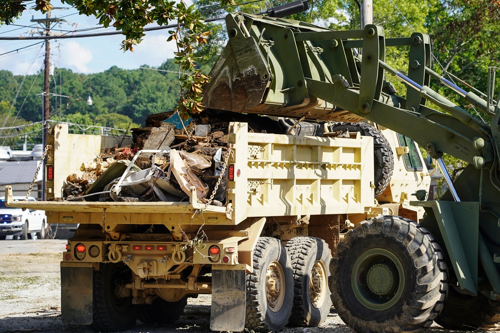 National Guard Loading Trucks With Debris