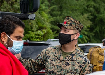 Marines Work with Afghans