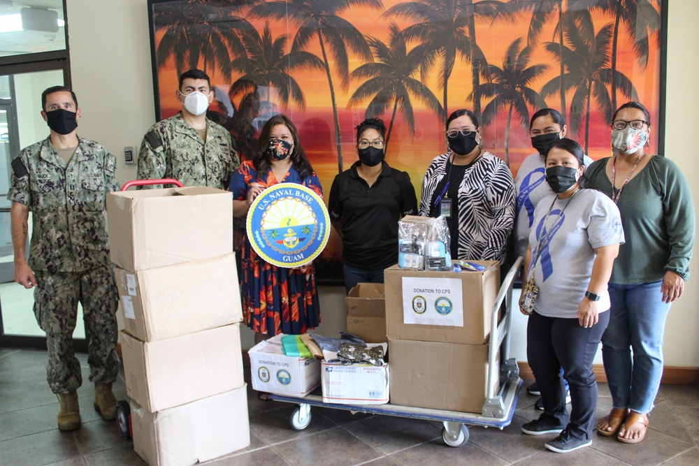 Naval Base Guam and USS Michael Murphy (DDG 112) Donates to Child Protective Services