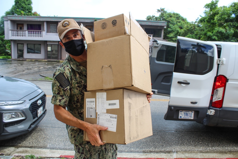 Naval Base Guam and USS Michael Murphy (DDG 112) Donates to Child Protective Services