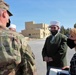 130th Field Artillery Brigade chaplain speaks with a Muslim leader during an interfaith event