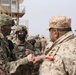 Col. Paul Schneider of the 130th Field Artillery Brigade meets host nation leaders at Kuwaiti Liberation live fire event