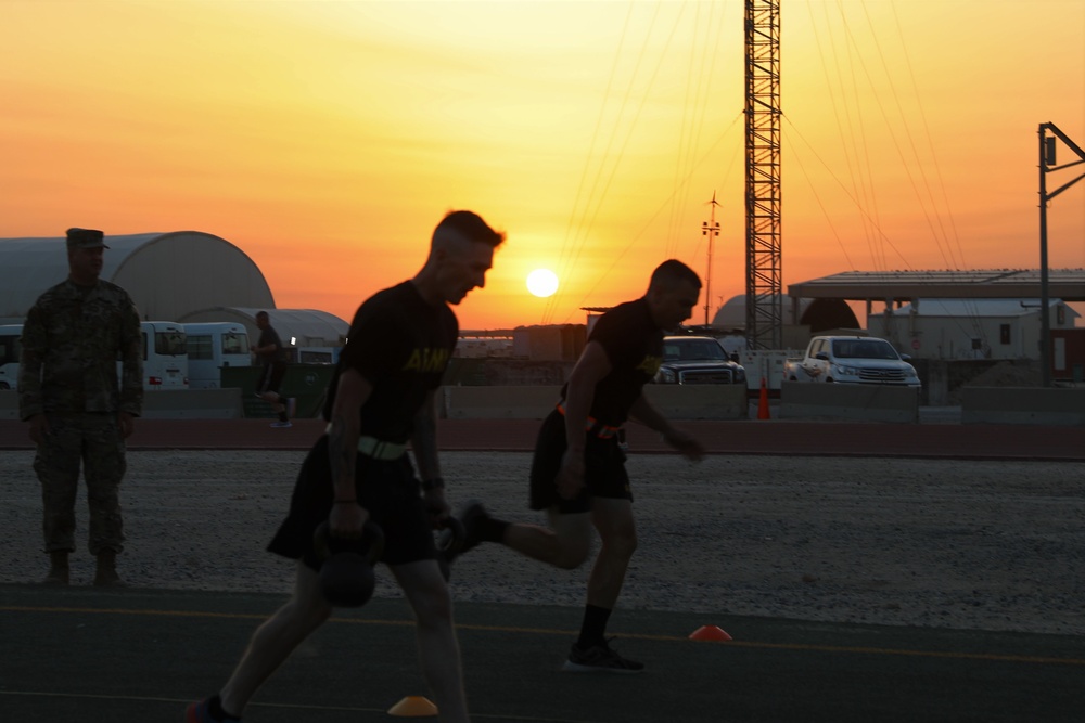 Soldiers run at sunset during the ACFT