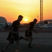 Soldiers run at sunset during the ACFT