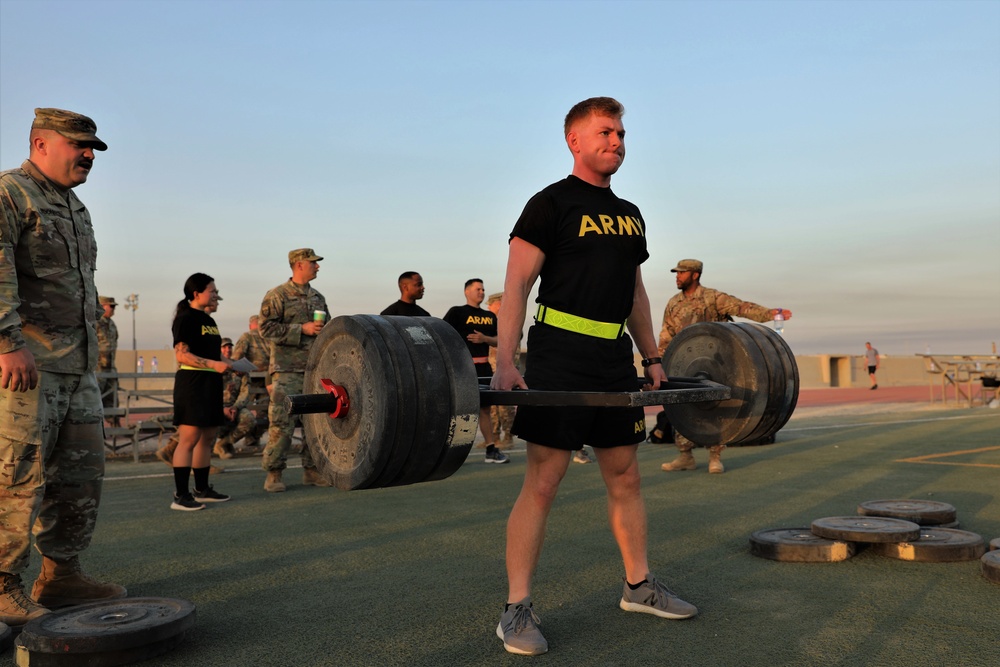 Sgt. Erik Wold completes the dead lift event during the ACFT at the Task Force Spartan best warrior competition in Kuwait