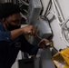 USS Carl Vinson (CVN 70) Conducts Maintenance On A Battle Lantern