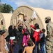 Soldiers from the 21st Theater Sustainment Command work together during Operation Allies Refuge