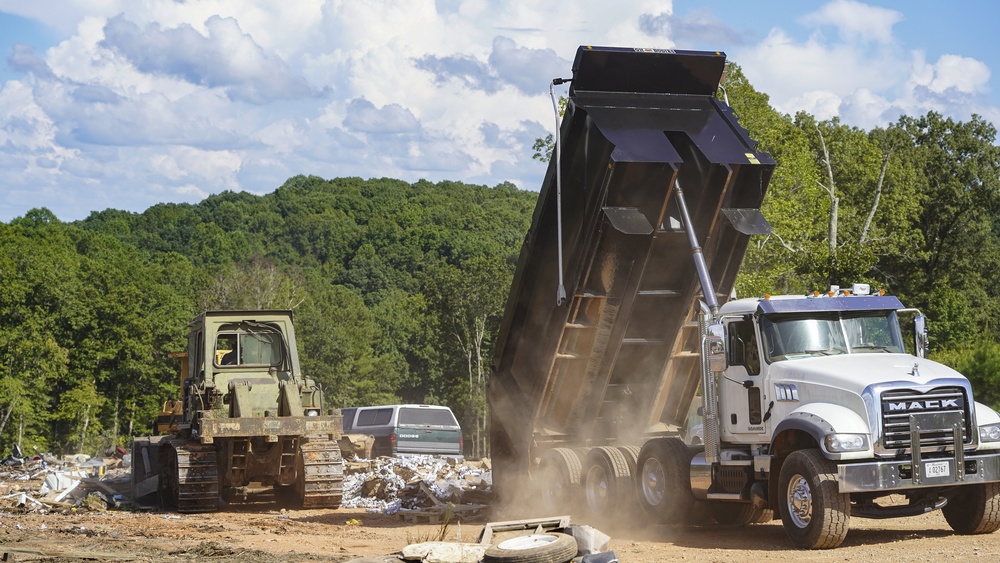 Debris Dumped While National Guard Levels The Pile