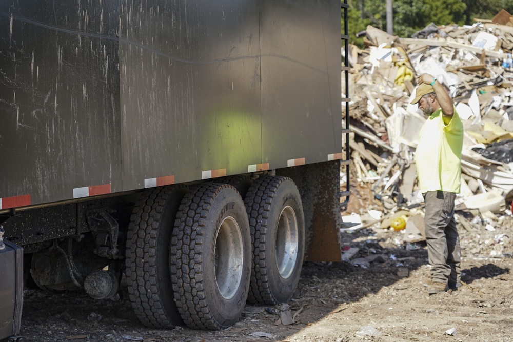 Positioning Debris Truck at Landfill