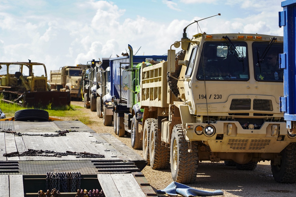 Trucks Entering Landfill With Debris