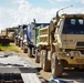 Trucks Entering Landfill With Debris